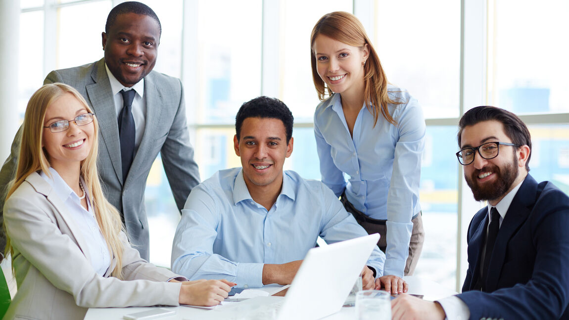 Home based travel agent working from a home office planning luxury holidays